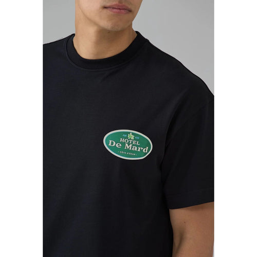 Load image into Gallery viewer, AZAT MARD HOTEL DE MARD BLACK T-SHIRT
