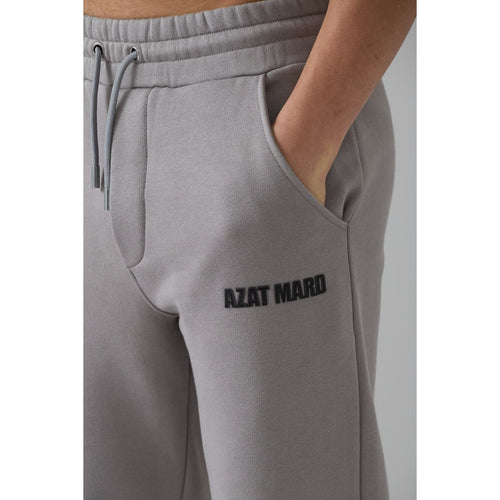 Load image into Gallery viewer, AZAT MARD GREY CREST JOGGERS
