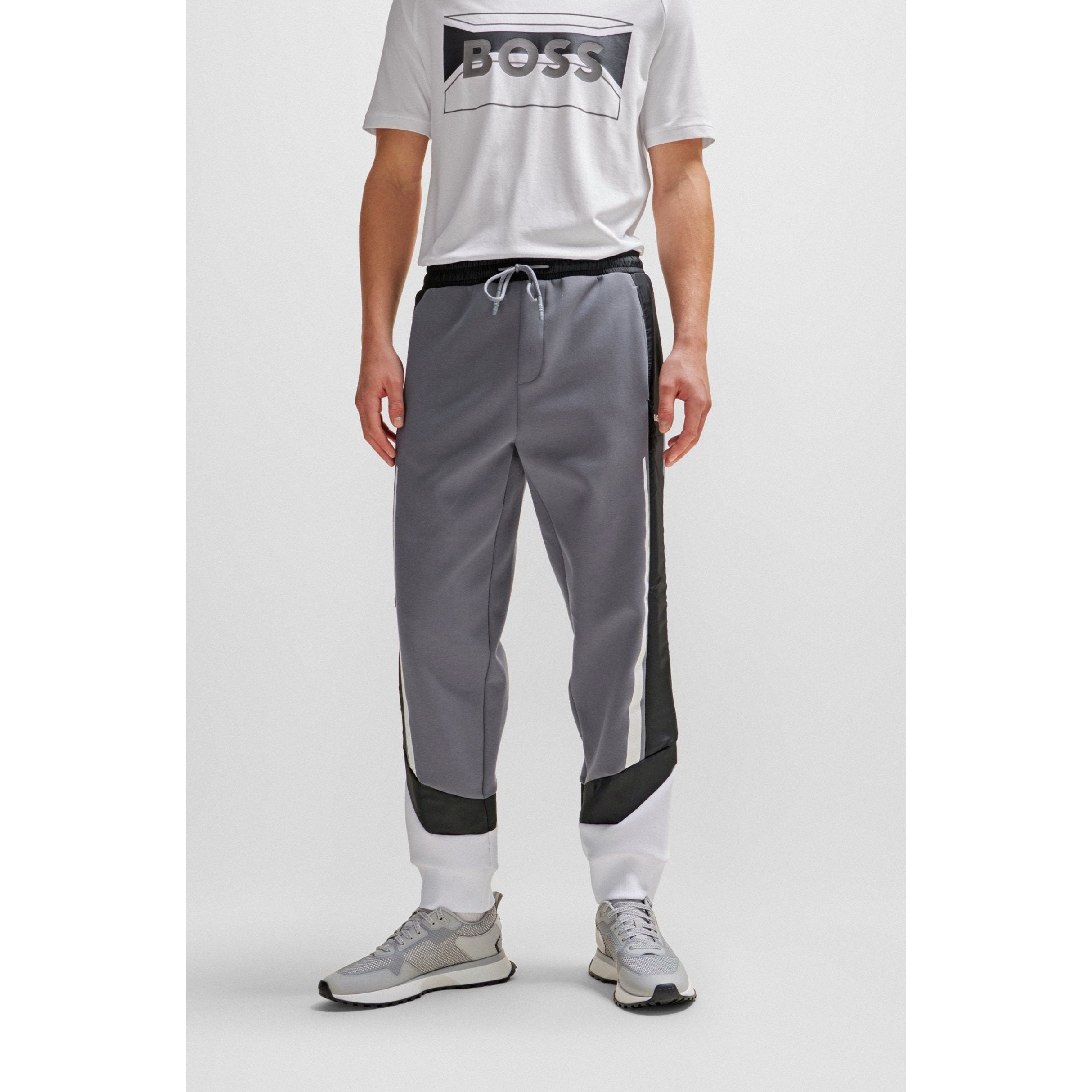 BOSS - Cuffed tracksuit bottoms in French terry with logo print