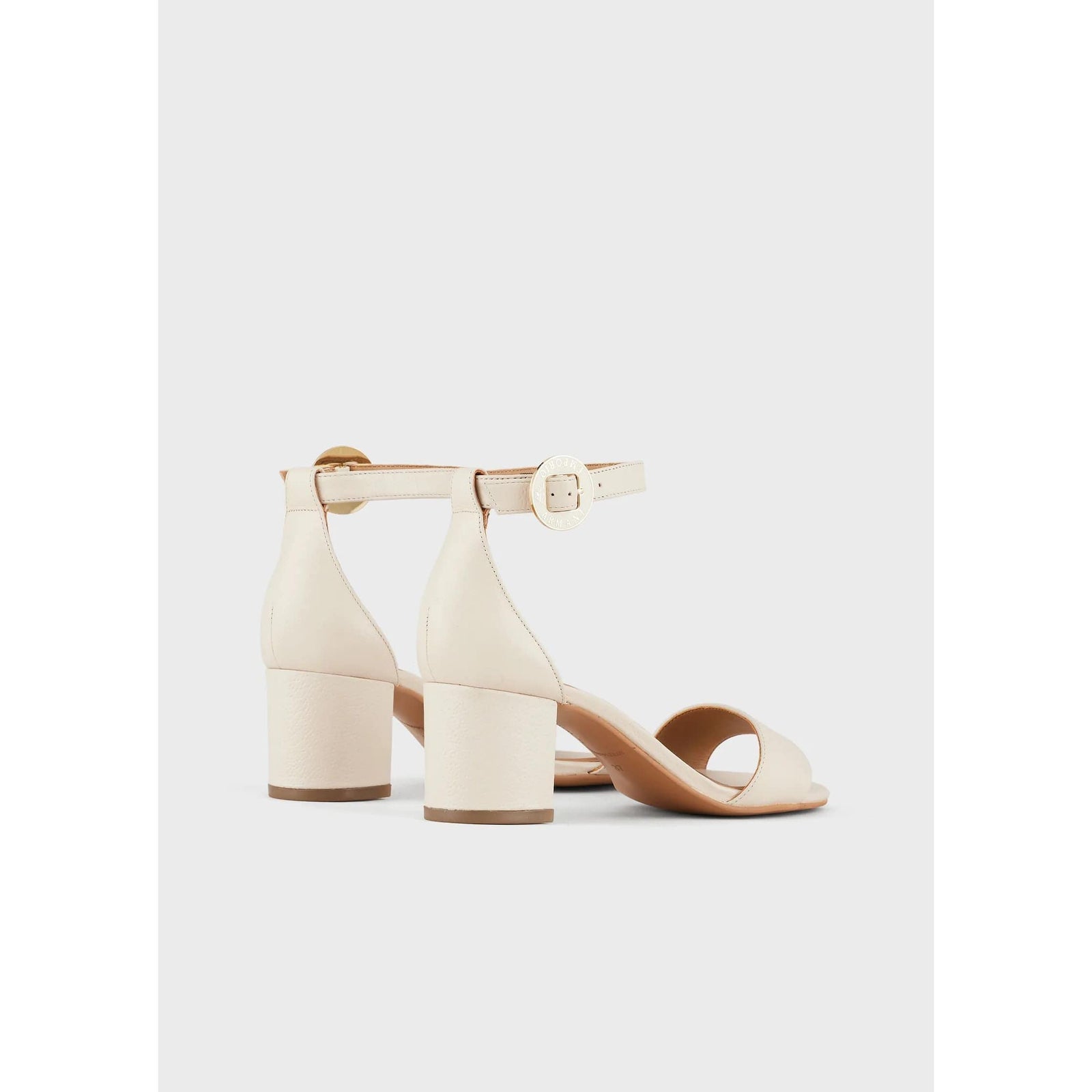 Leather sandals with heel and logoed medal - Yooto