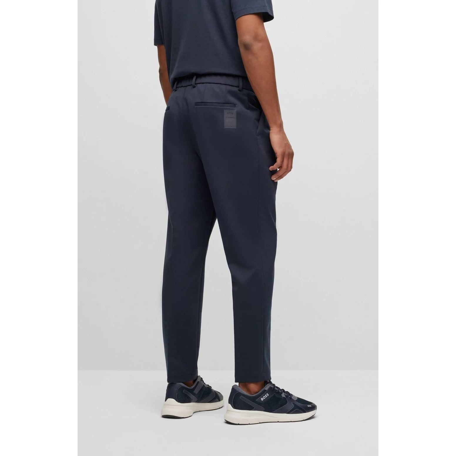 BOSS BOSS X AJBXNG TAPERED-FIT TROUSERS IN STRETCH JERSEY WITH FRONT PLEATS - Yooto